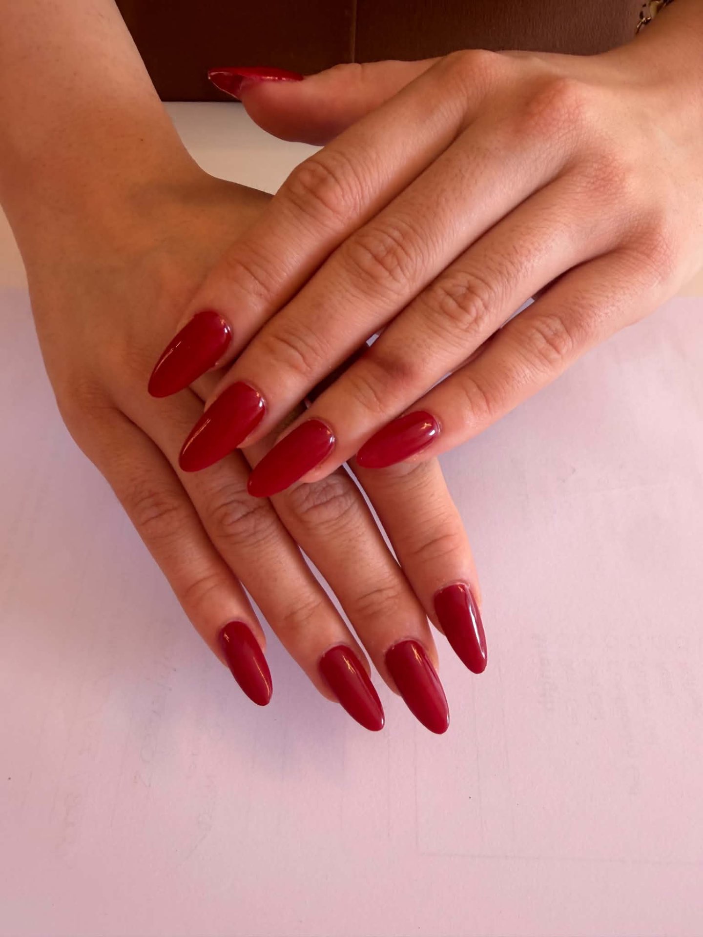 Deep red almond gel nails