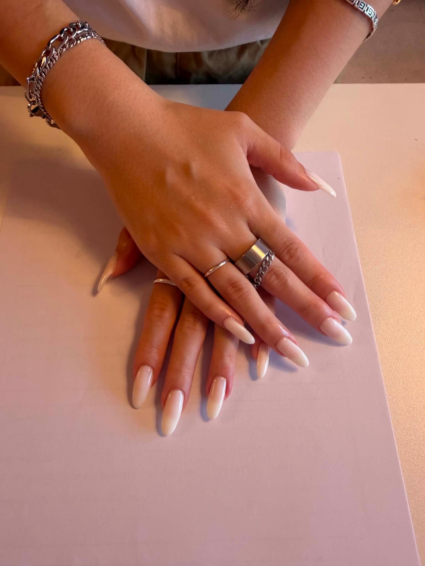 Milky white almond nails