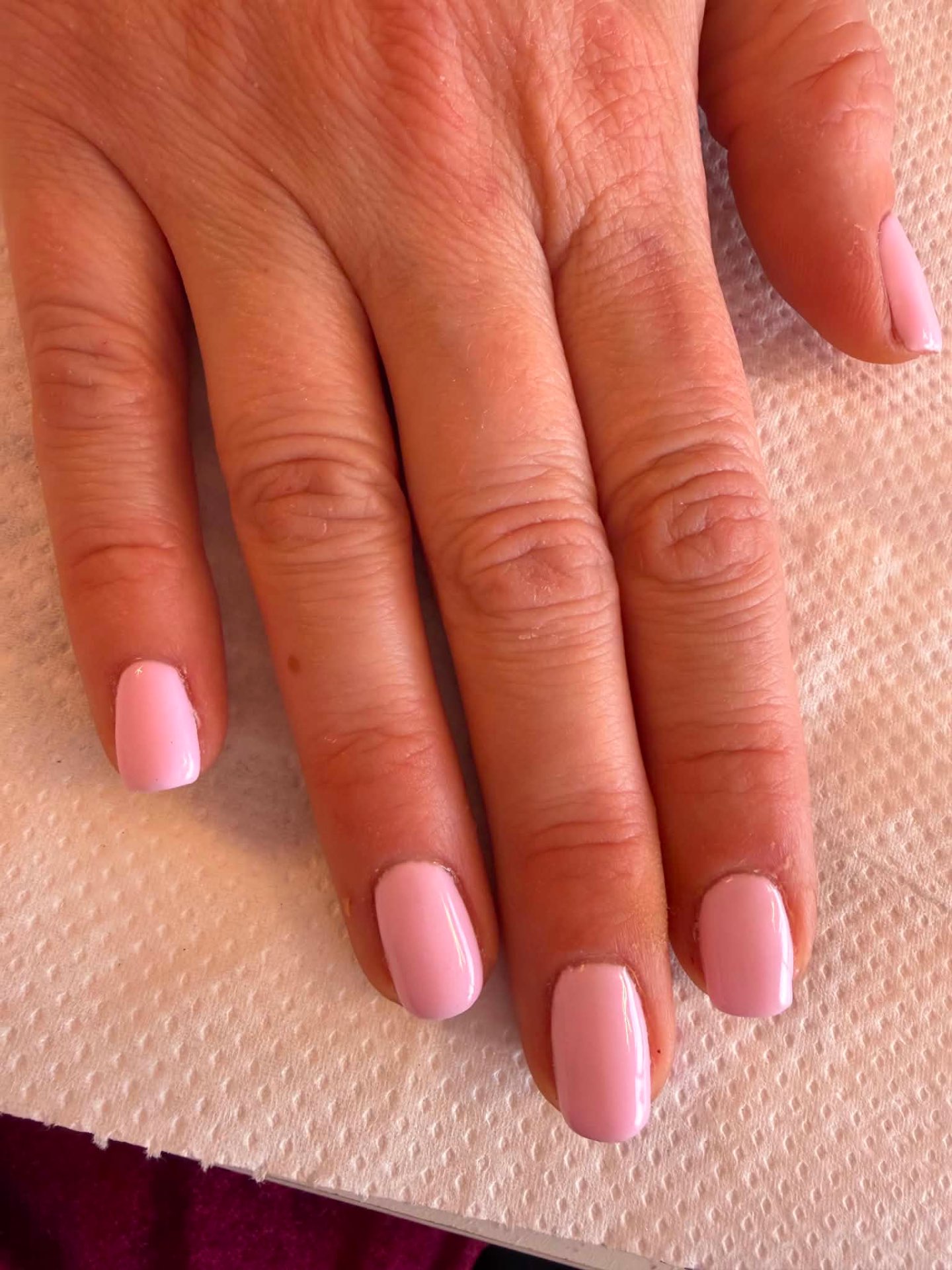 Short glossy baby pink gel nails